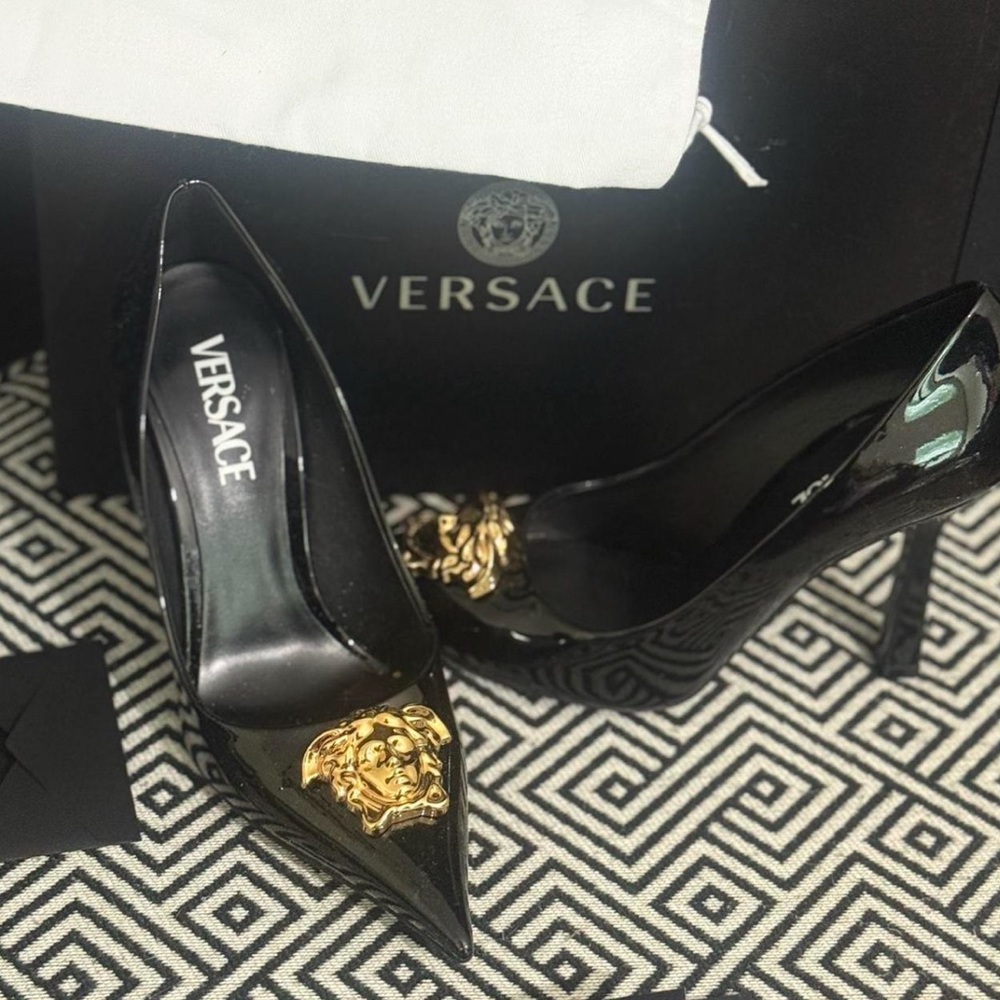 Versace Black and Gold Stiletto Heels
Authentic!